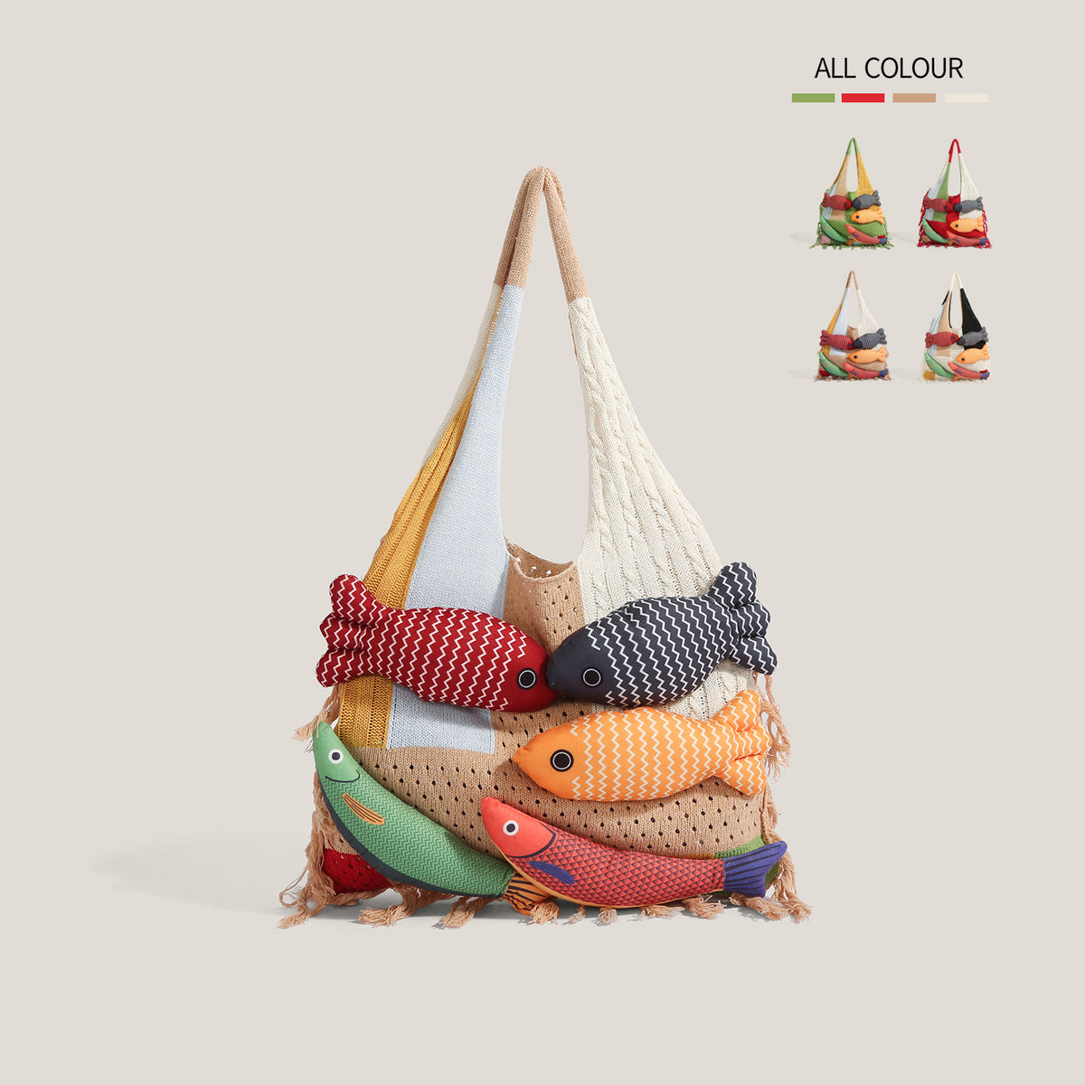 Khaki knitted fish tote bag on a beige background - camel, cream and soft blue patchwork knit panels, five stuffed 3D fish appliques with googly eyes, tan fringe at the hem, ALL COLOUR swatch chart in the corner