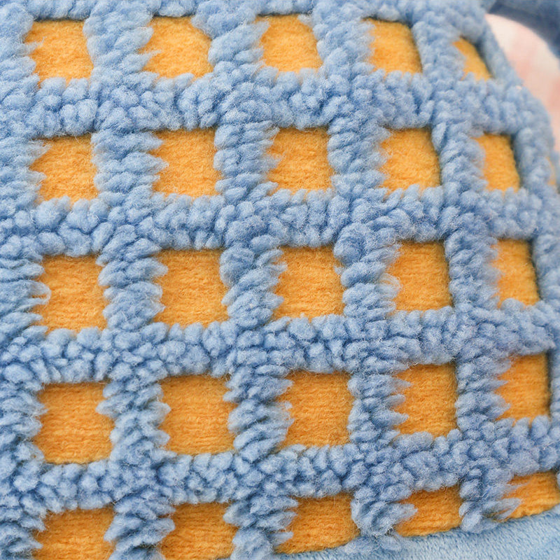 Plush monster character pillow close-up detail, soft polyester fiberfill and pastel color, huggable back cushion for adults and teens